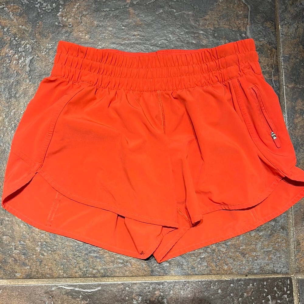 Lululemon tracker shorts. VEUC! Bright red orange color
